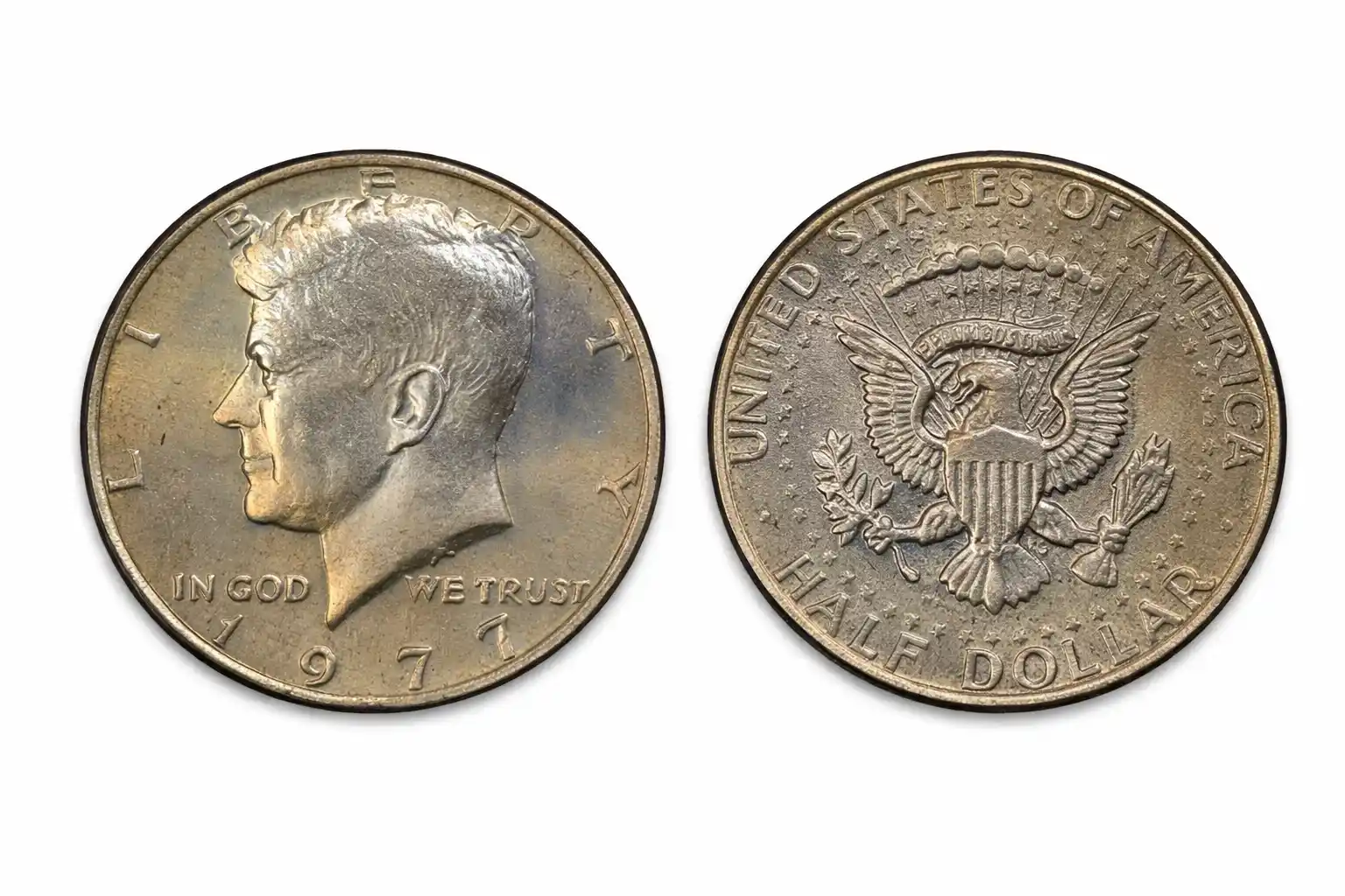 Obverse and reverse of a 1977 Kennedy half dollar on a white background.